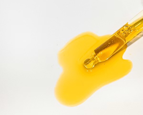 Abstract infographic showing types of biomimetic peptides used in anti-aging skincare